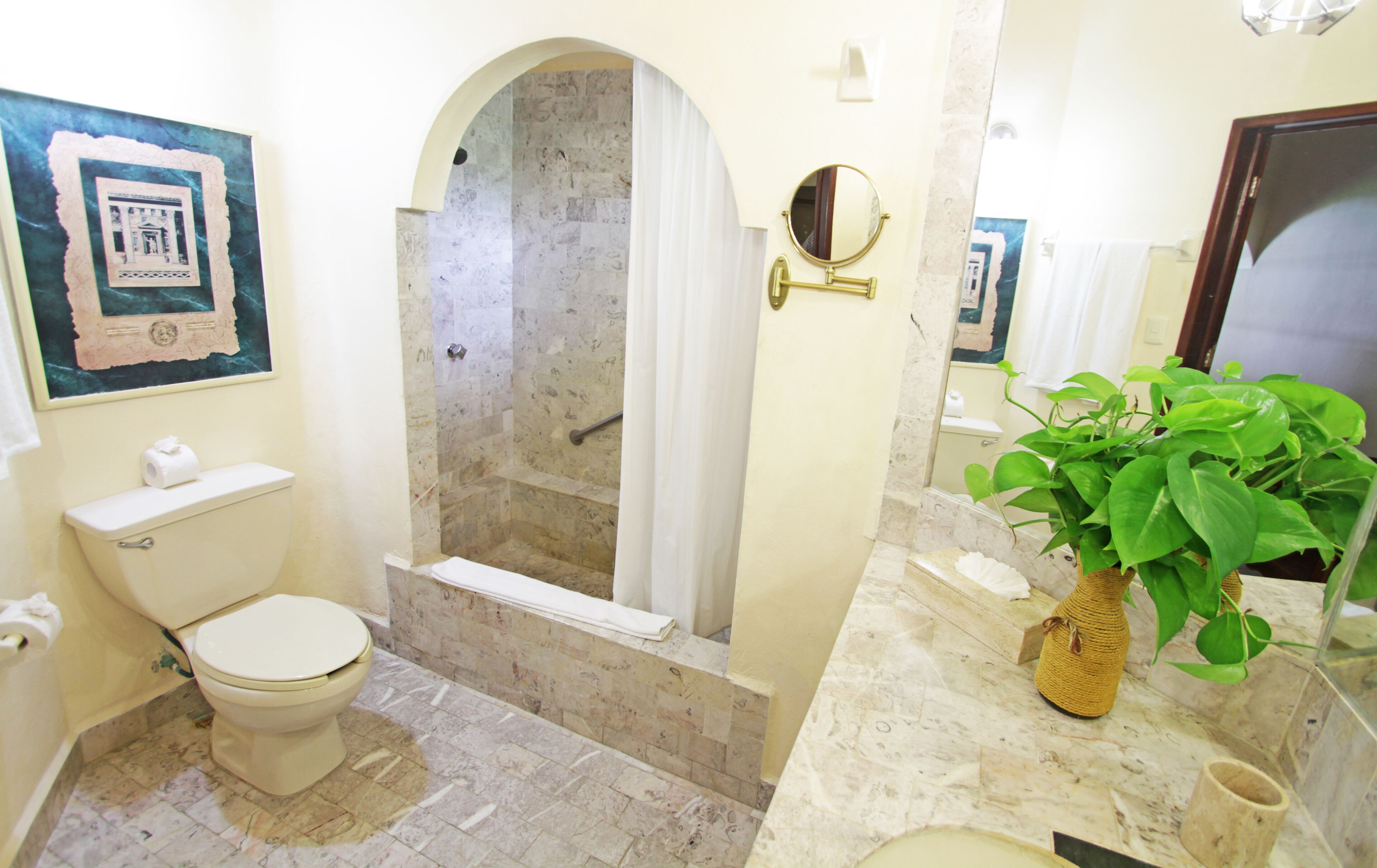 Deep-soaking bathtub, rainfall showerhead, free toiletries, hair dryer