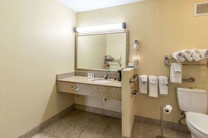 Room, 1 King Bed, Accessible, Non Smoking | Bathroom | Hair dryer, towels, soap, shampoo