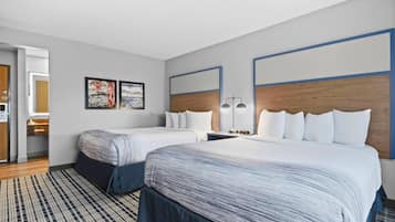 Room, 2 Queen Beds, Non Smoking | In-room safe, desk, iron/ironing board, free cots/infant beds
