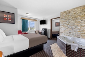 Desk, bed sheets - Rodeway Inn Rapid City North (Rapid City)