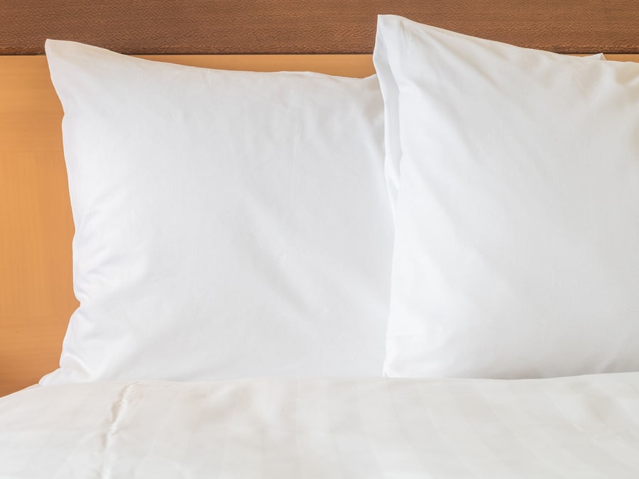 Premium bedding, desk, laptop workspace, iron/ironing board