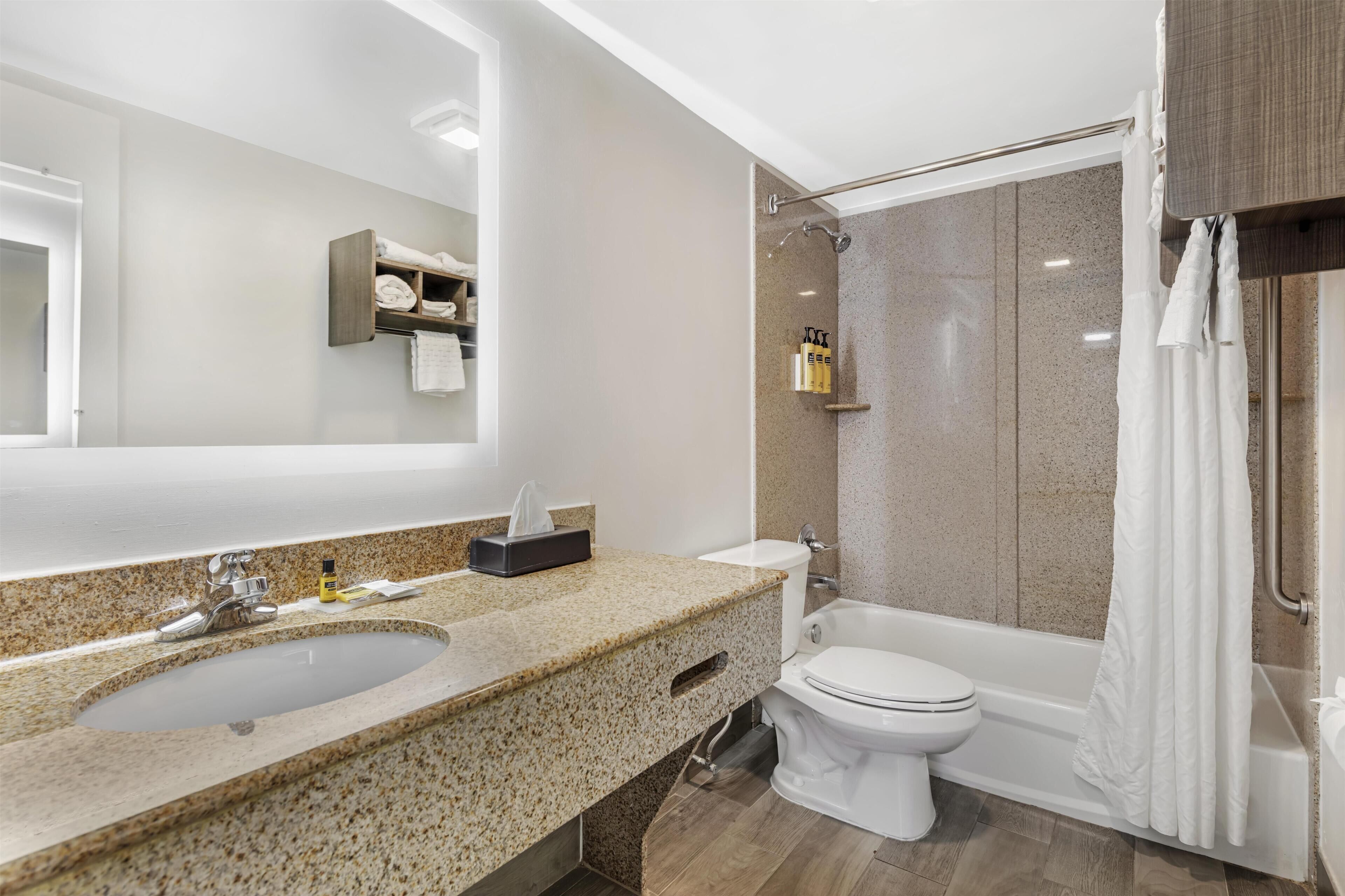 Deep soaking tub, hydromassage showerhead, free toiletries, hair dryer