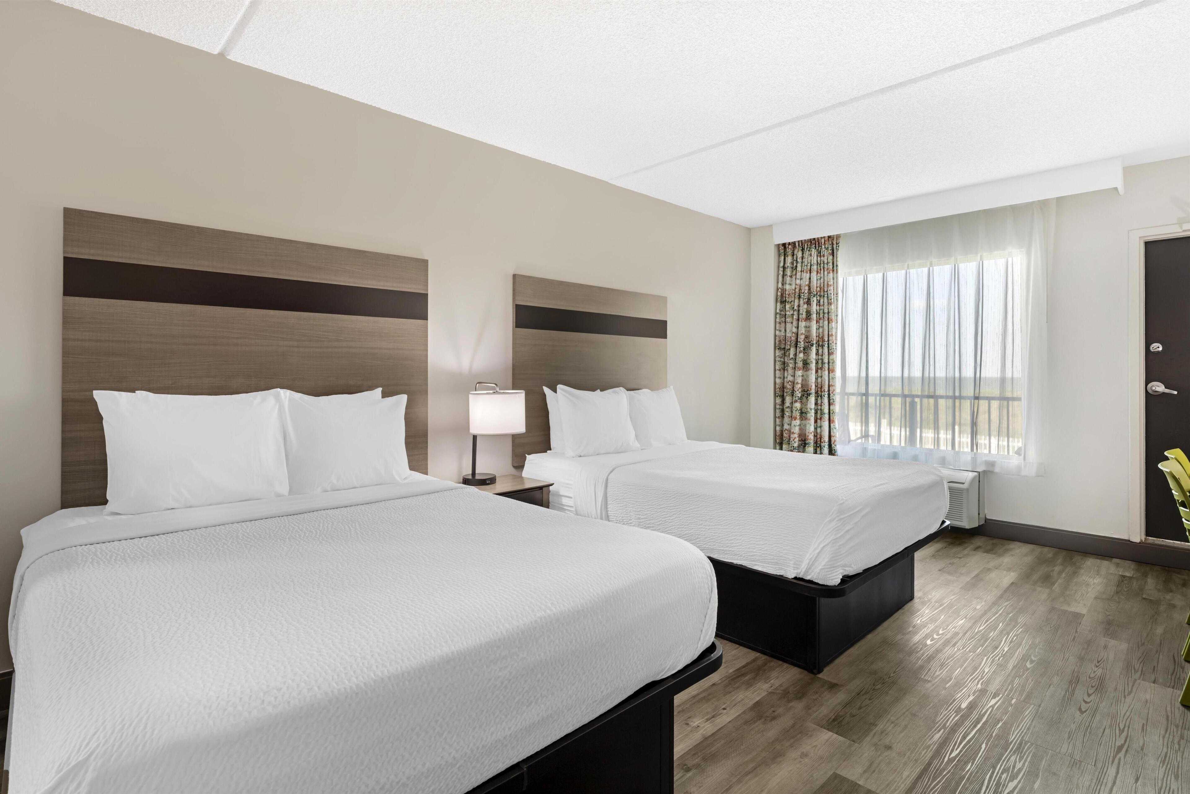 Standard Room, 2 Queen Beds, Balcony, Oceanfront (Pet Friendly) | In-room safe, desk, laptop workspace, iron/ironing board