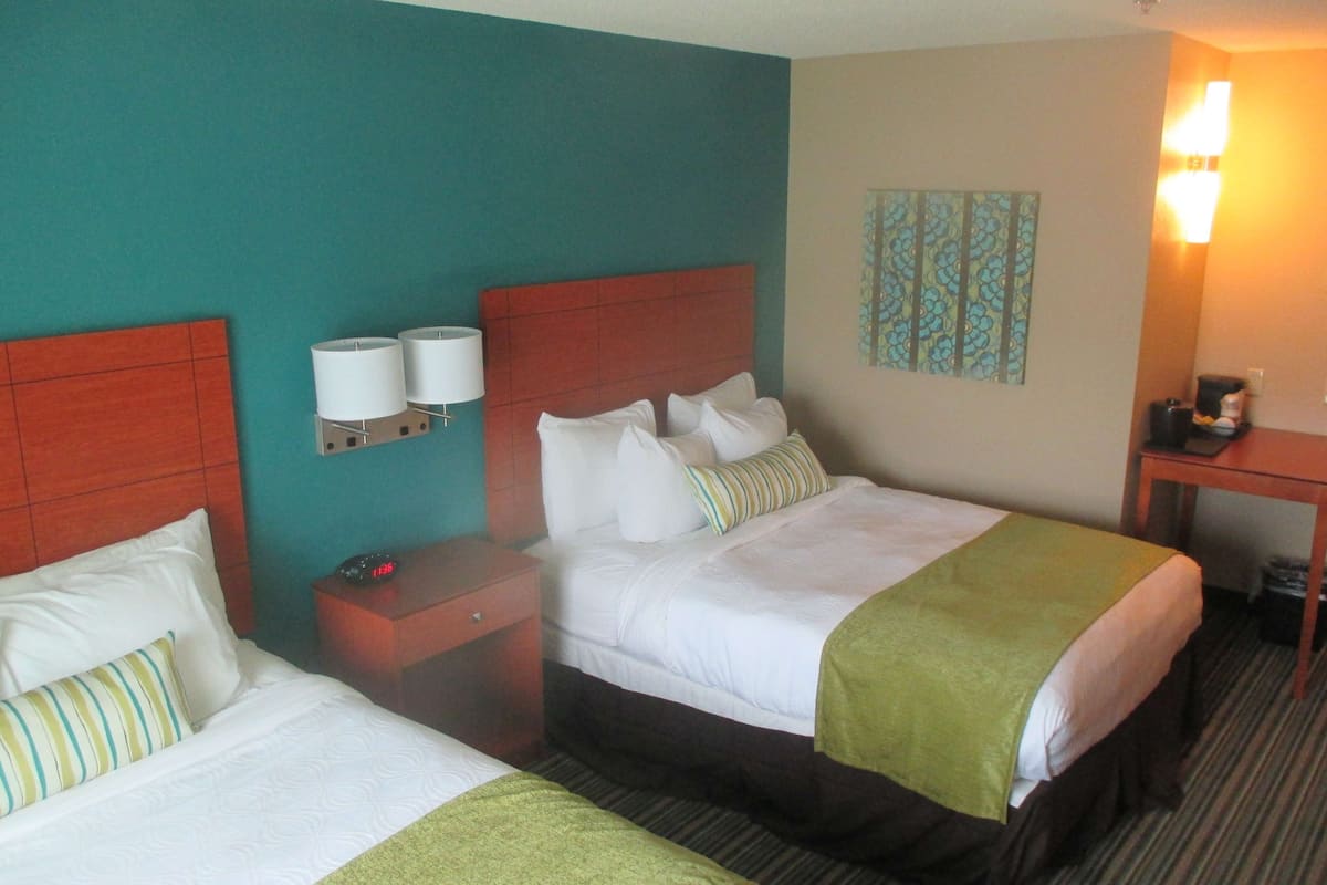 Standard Room, 2 Queen Beds, Non Smoking, Microwave | 1 bedroom, desk, iron/ironing board, free cribs/infant beds