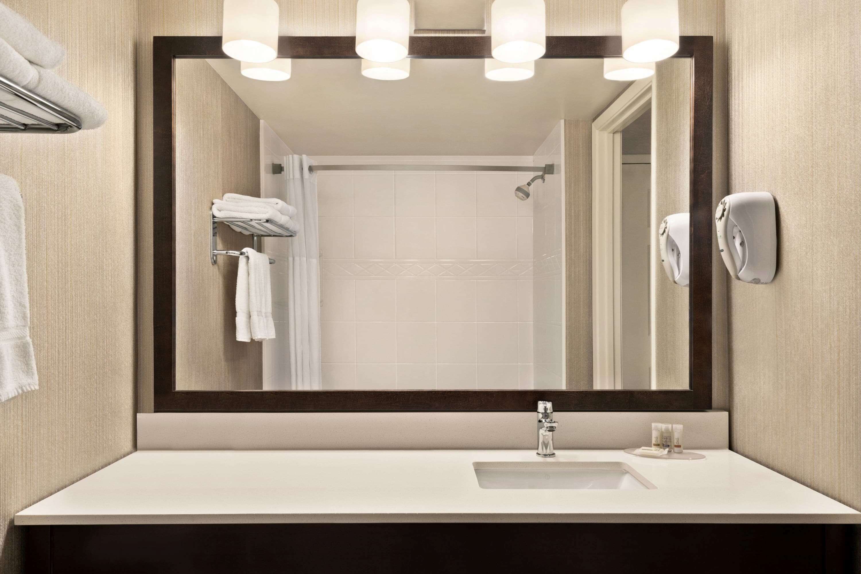 combined shower/bathtub, free toiletries, hair dryer, towels