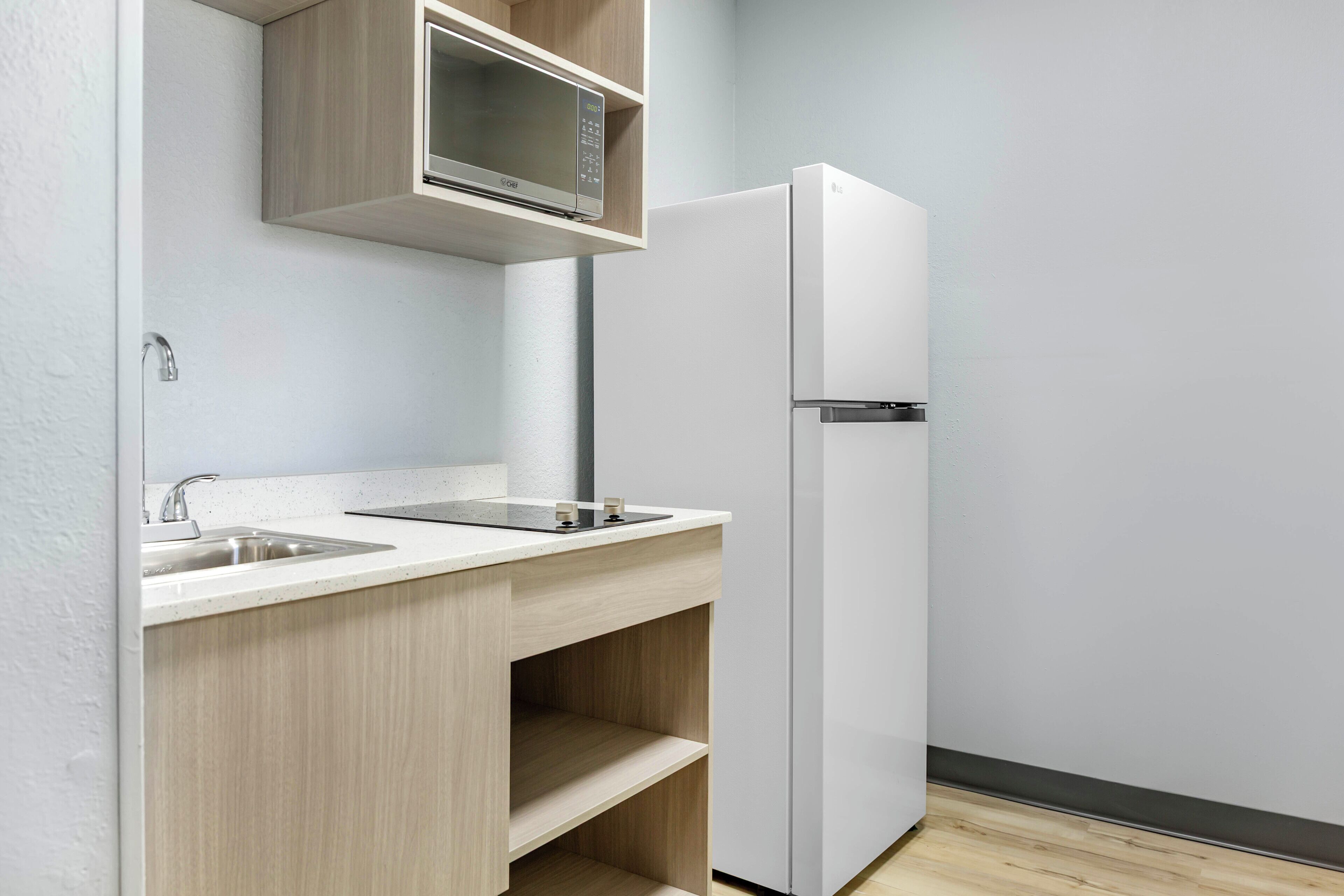 Deluxe Room, 2 Double Beds, Non Smoking (Efficiency) | Private kitchenette | Full-size fridge, microwave, stovetop, cookware/dishes/utensils