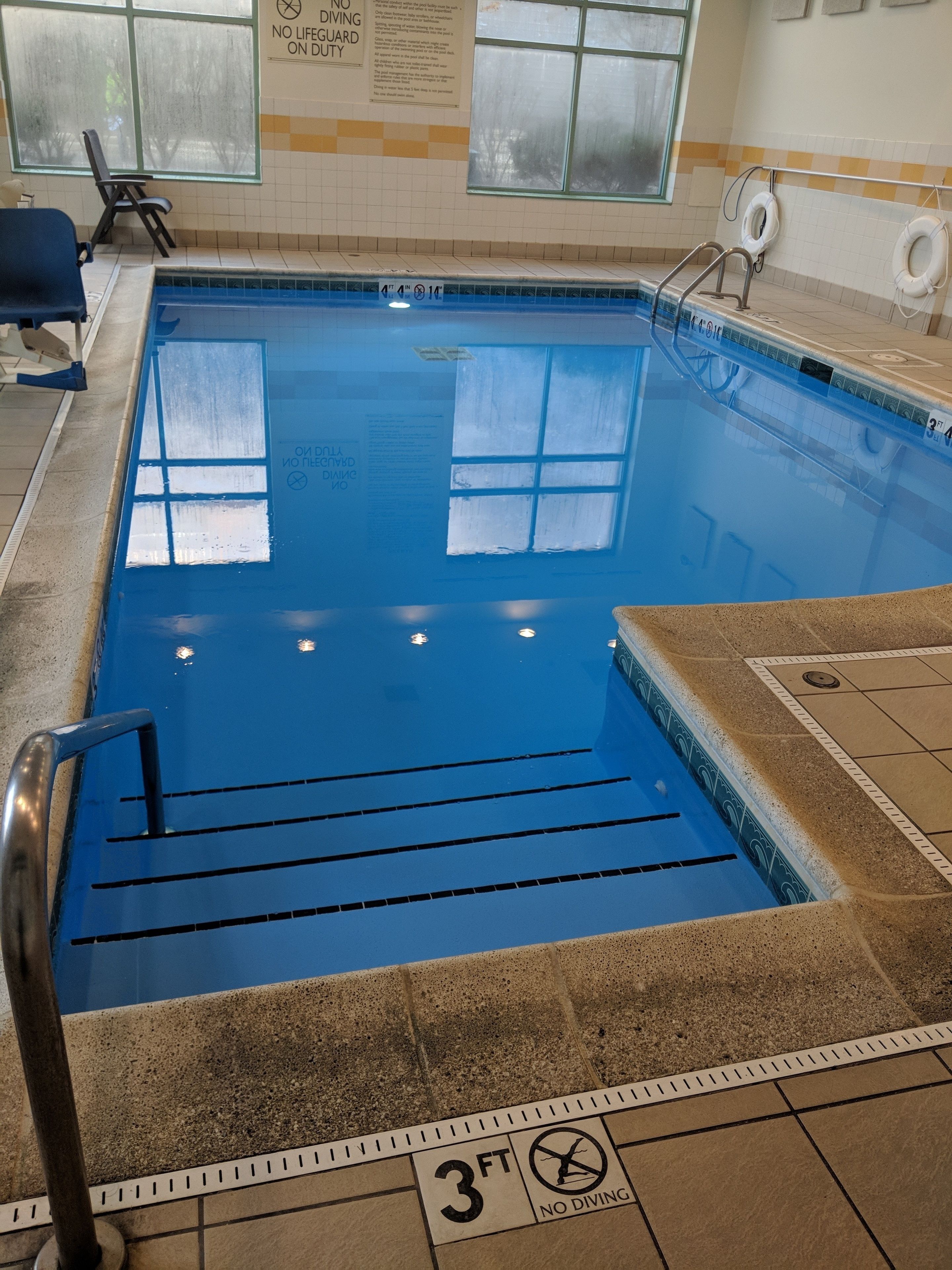 indoor pool, pool loungers