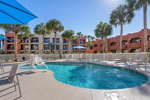 Outdoor pool, pool umbrellas, sun loungers