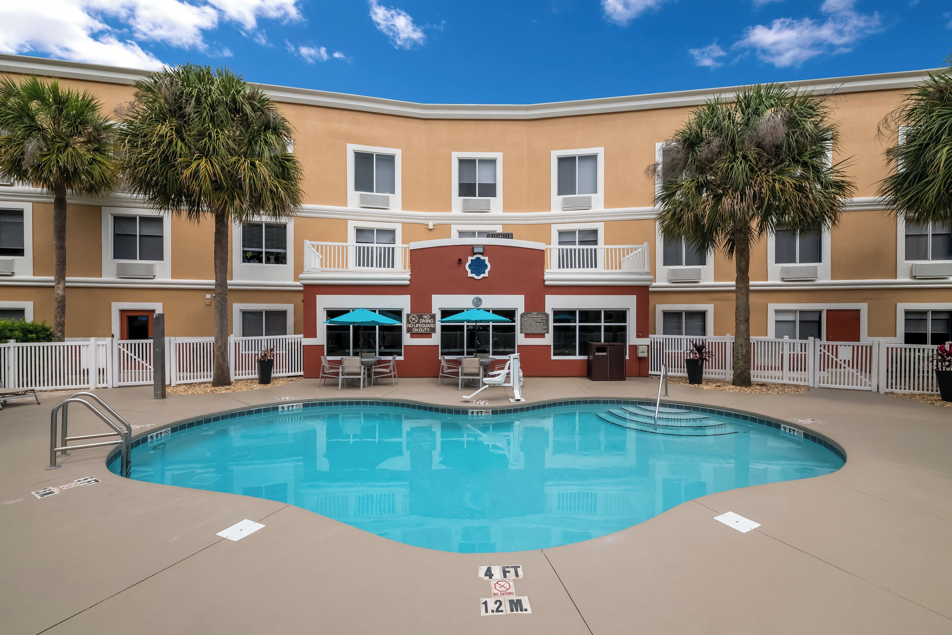 Outdoor pool, pool umbrellas, pool loungers
