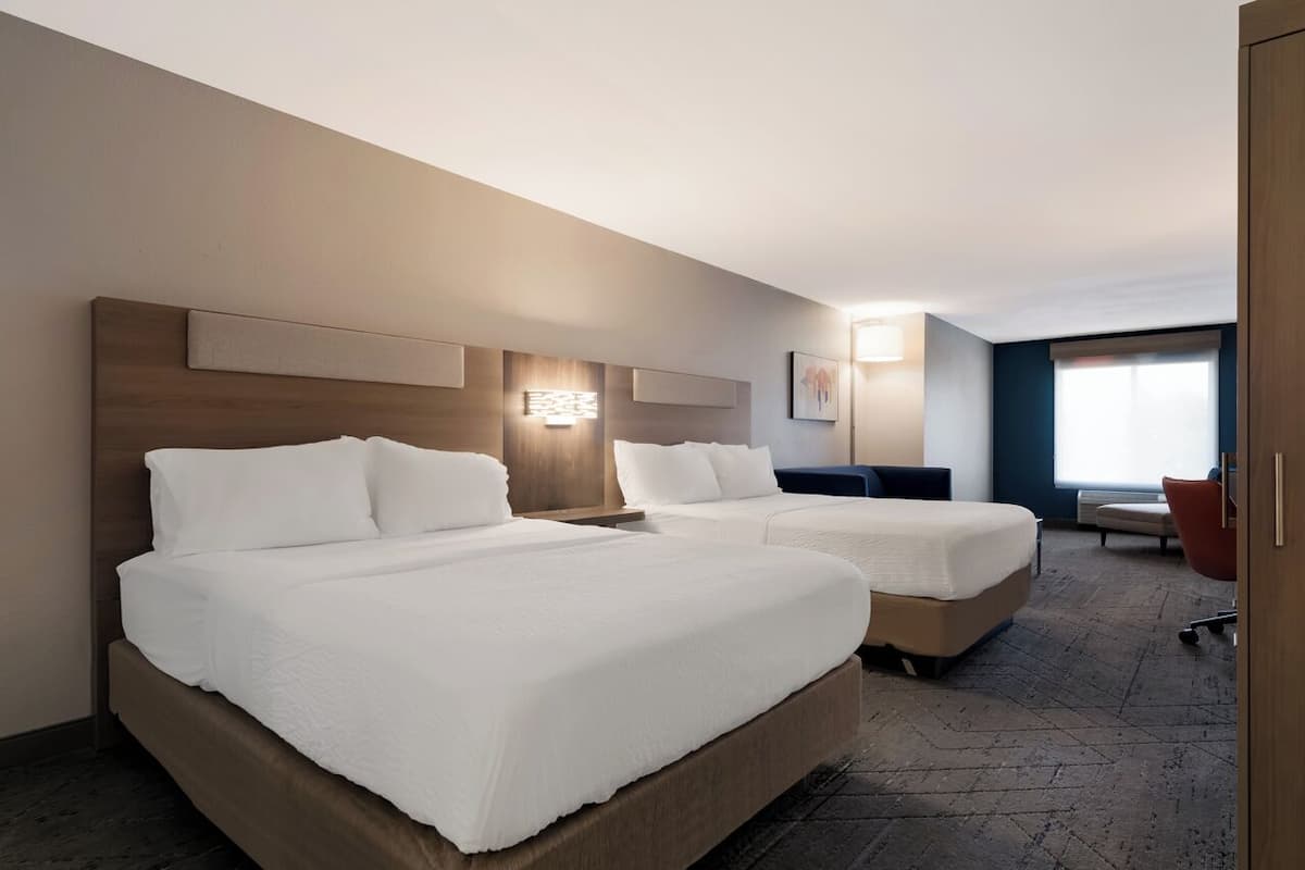 Suite, Multiple Beds | Premium bedding, pillowtop beds, in-room safe, desk