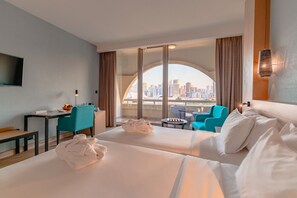 Premium bedding, down comforters, minibar, in-room safe