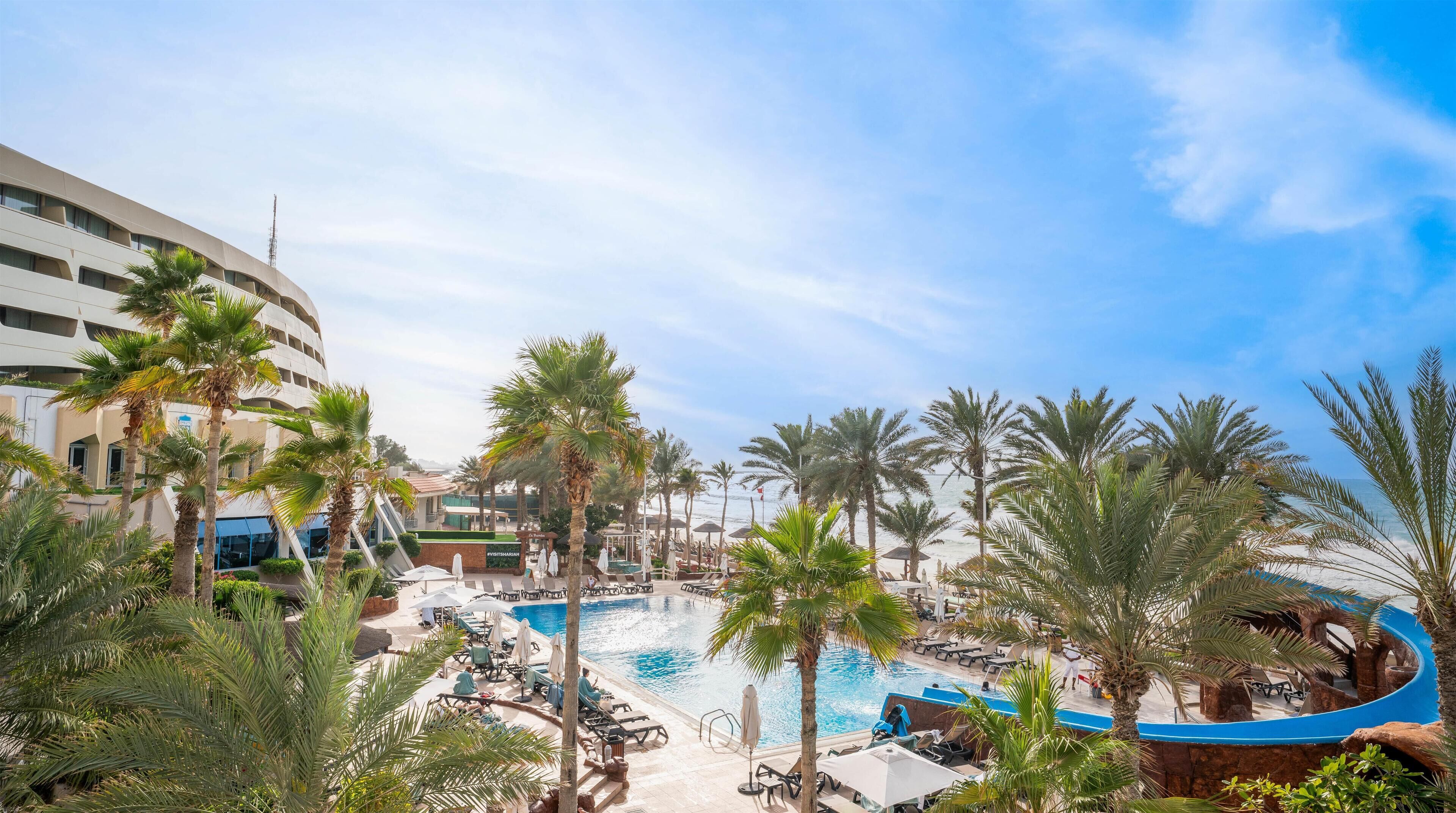 Outdoor pool, open 7:00 AM to 8:00 PM, pool umbrellas, sun loungers