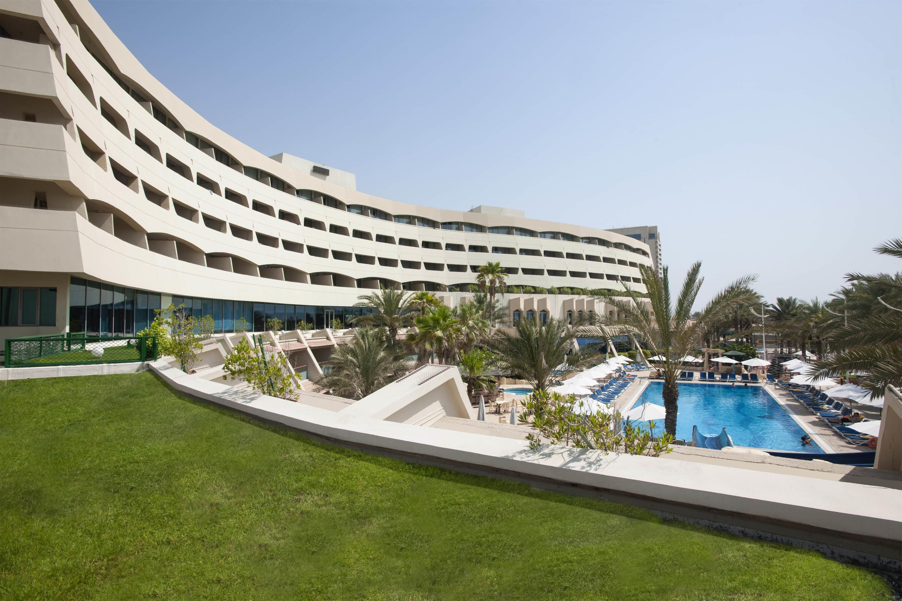 Outdoor pool, open 7:00 AM to 8:00 PM, pool umbrellas, sun loungers