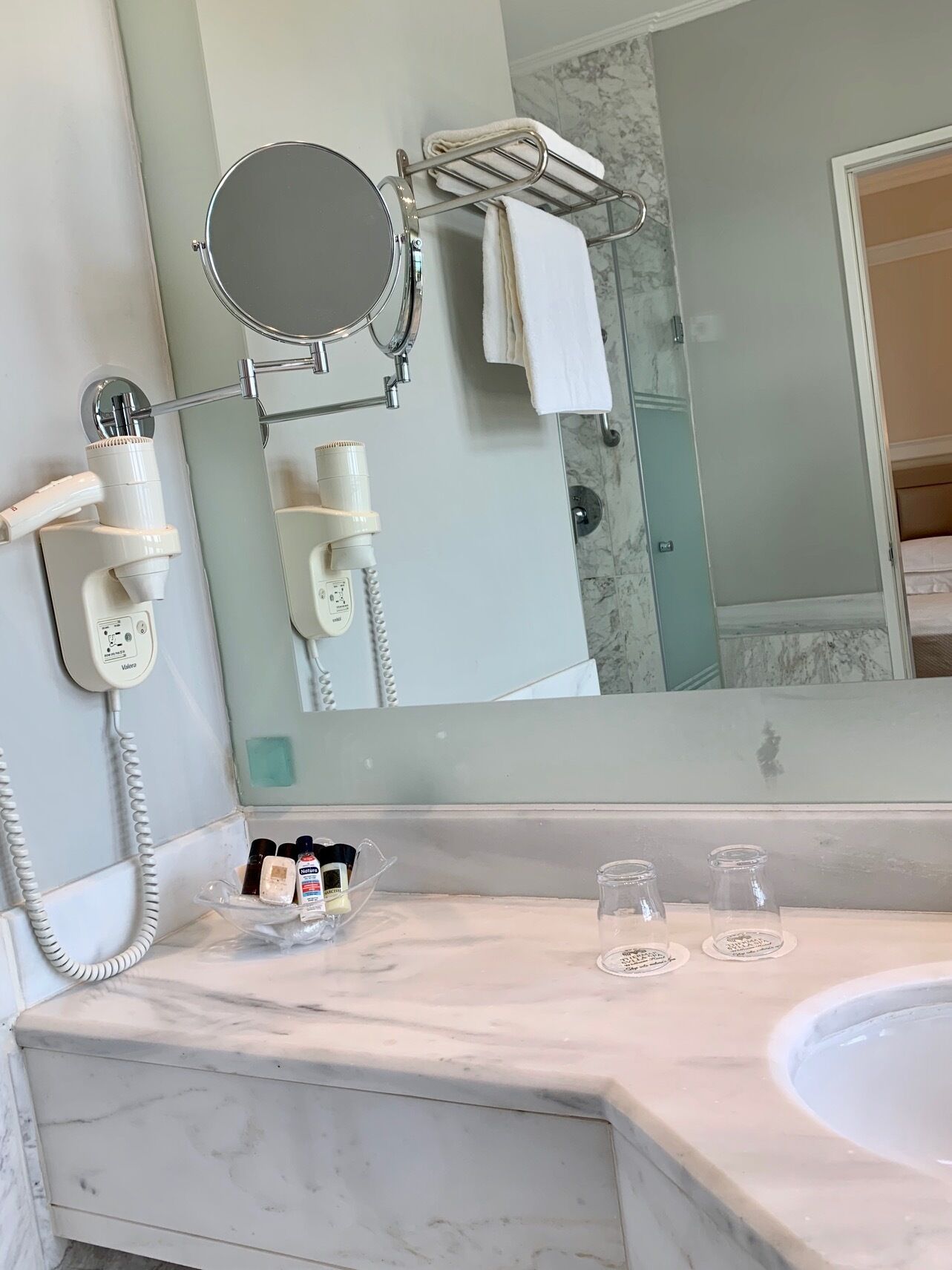 hair dryer, bathrobes, slippers, towels