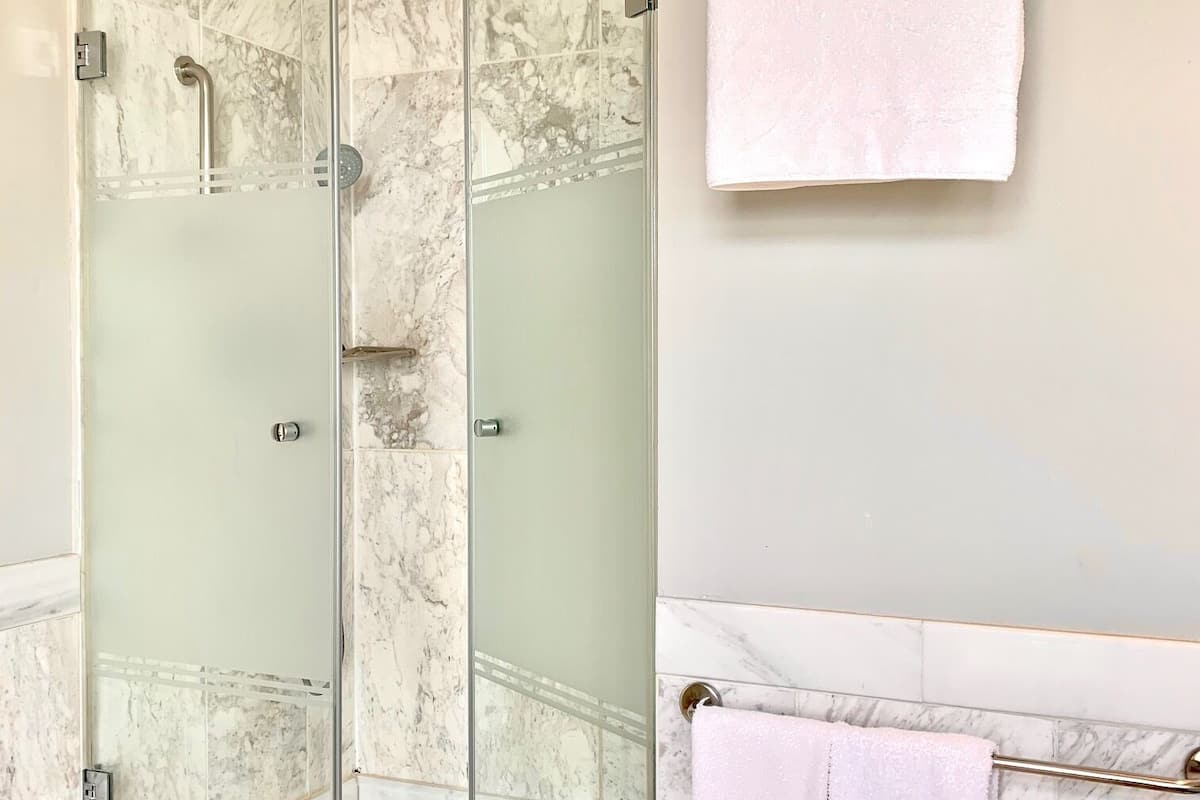 hair dryer, bathrobes, slippers, towels