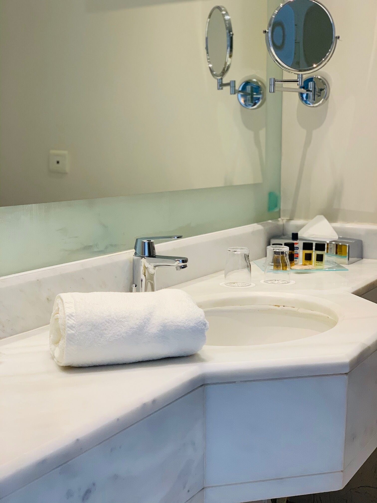 hair dryer, bathrobes, slippers, towels