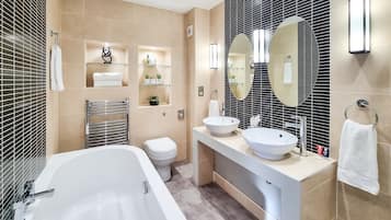 Suite, 1 Double Bed, Non Smoking | Bathroom | Combined shower/tub, designer toiletries, hair dryer, towels