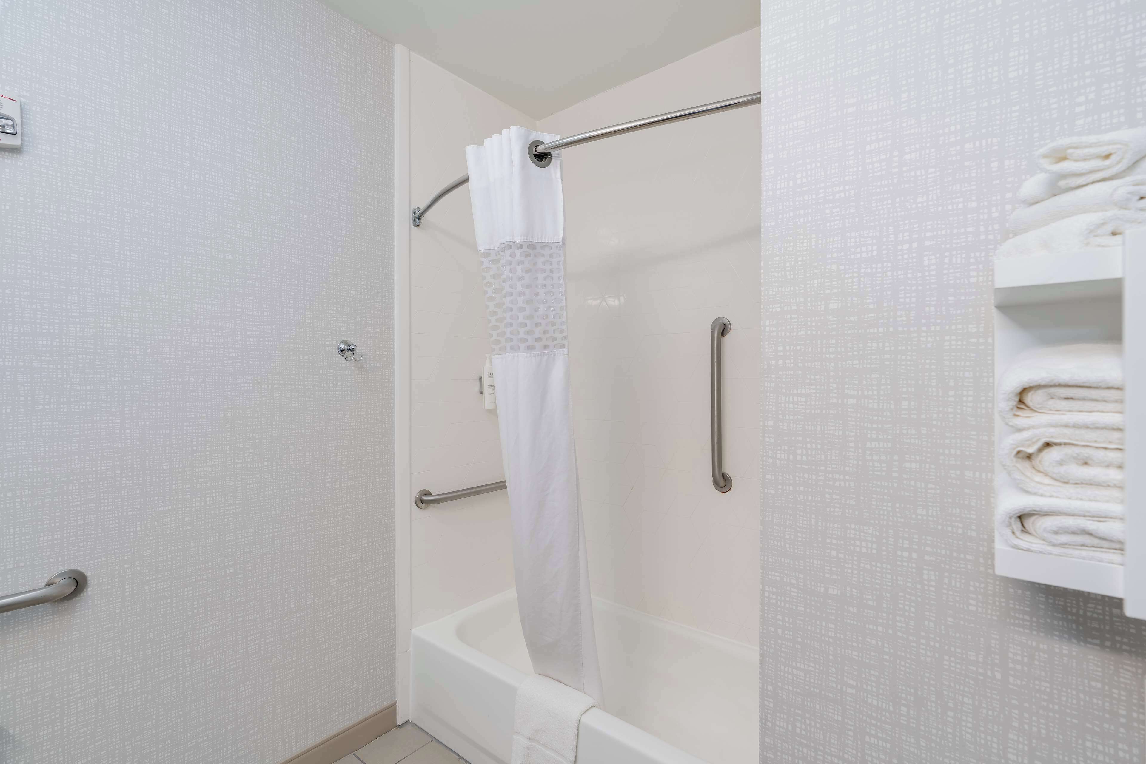 suite, 1 king bed, non smoking | bathroom | free toiletries, hair dryer