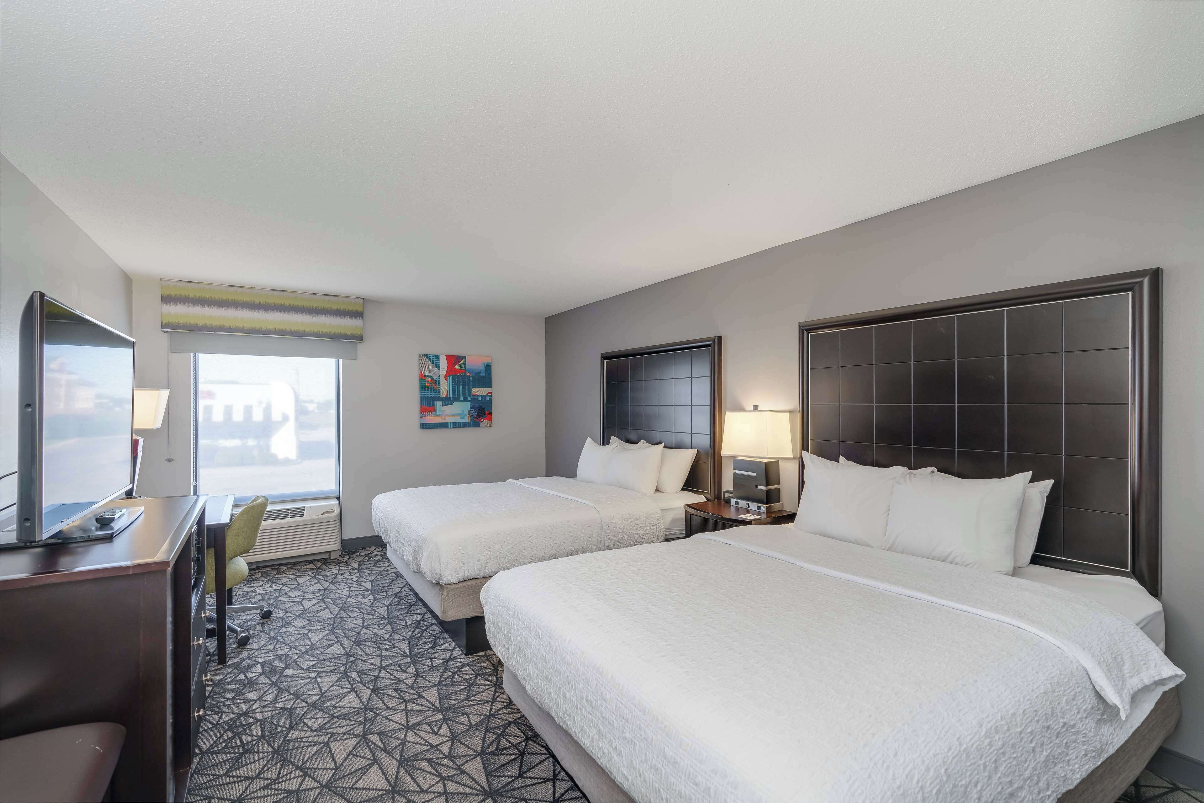 two queen beds, accessible | in-room safe, blackout curtains, iron/ironing board, cots/infant beds