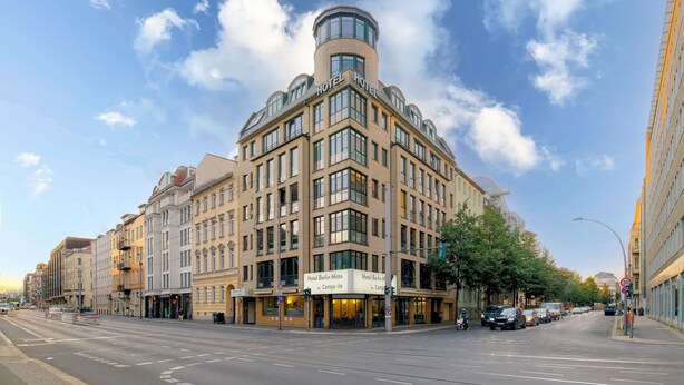 A corner building with multiple hotel signs, including "Hotel Berlin Mitte" and "Hotel Berlin Mitte by Campanile." - Hotel Berlin Mitte by Coffee Fellows (Berlin)