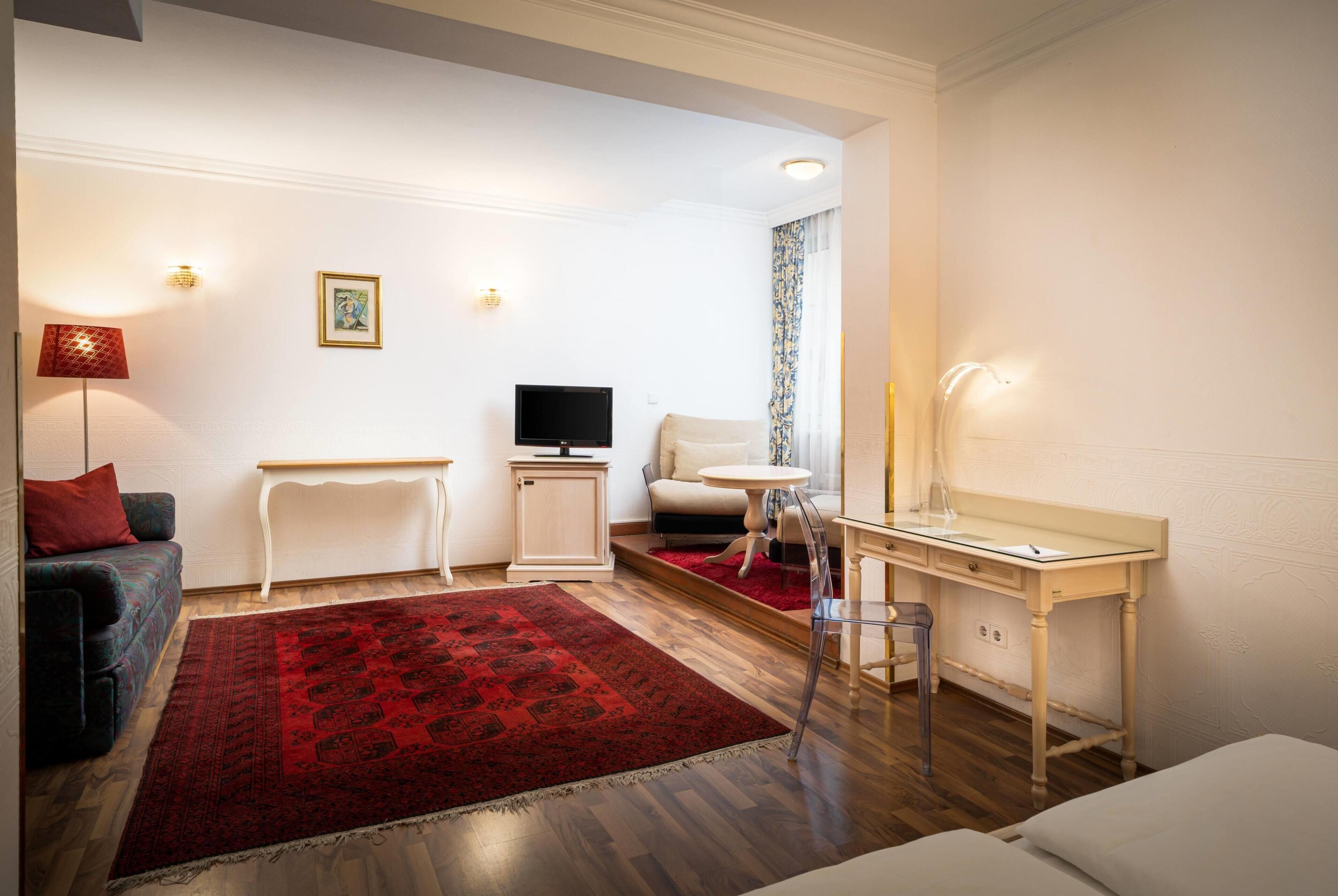 Quarto standard (Dreibettzimmer) | Frigobar, cofres nos quartos, individualmente decorados