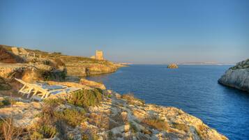 Privéstrand vlakbij, een gratis shuttleservice van/naar het strand