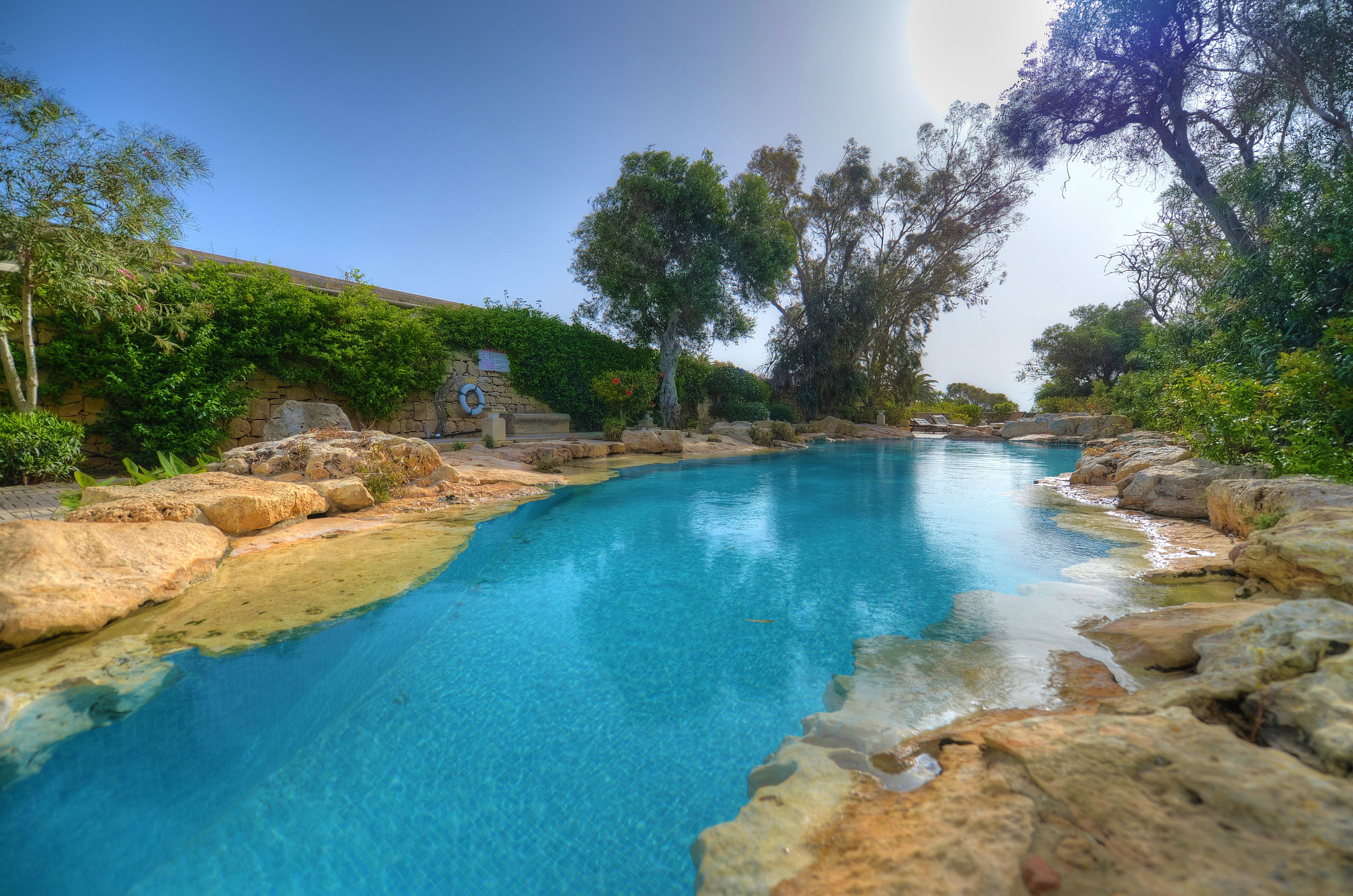 indoor pool, 2 outdoor pools, pool umbrellas, pool loungers