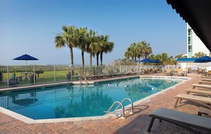 Outdoor pool, pool umbrellas, sun loungers