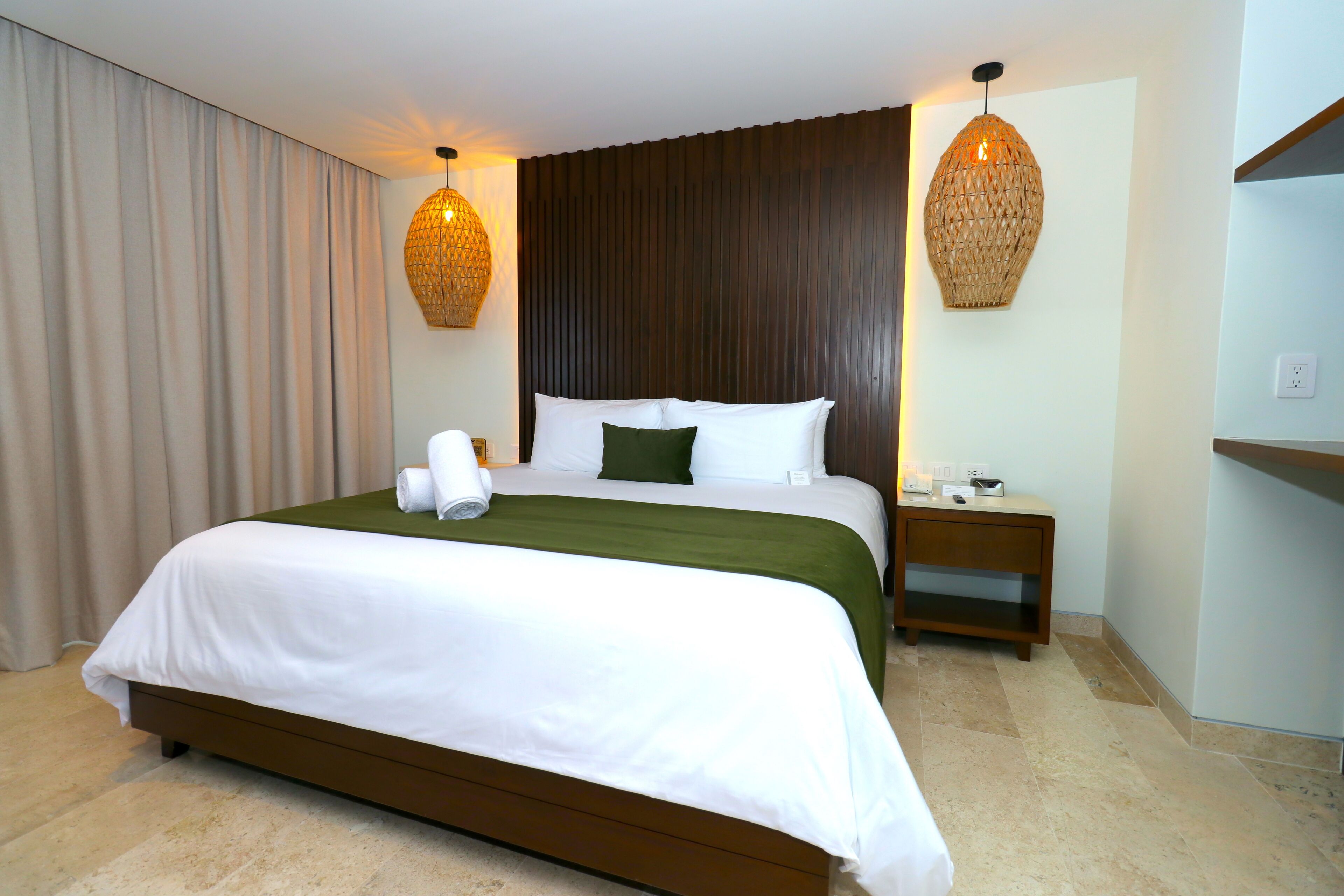 Suíte grand, vista para o mar | Roupa de cama