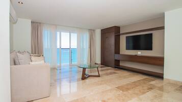 Suíte família, vista para o mar | Sala de estar
