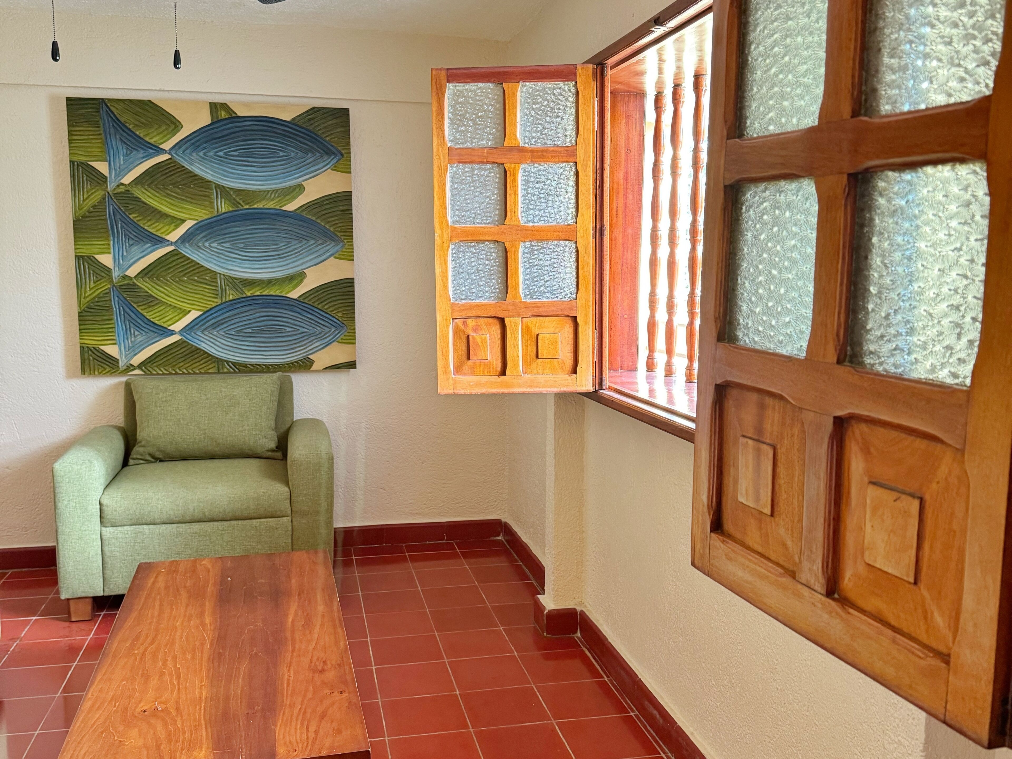 suite, 2 double beds | living area | plasma tv