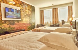 Family Room | 1 bedroom, minibar, in-room safe, desk