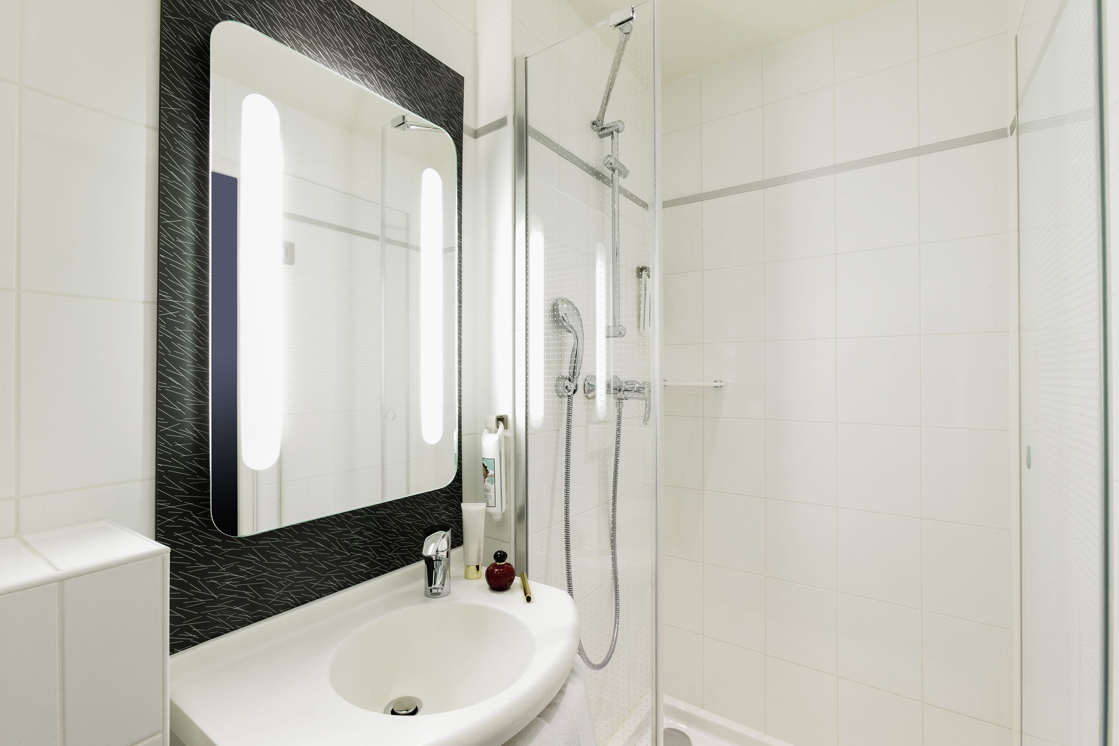 shower, eco-friendly toiletries, hair dryer, towels