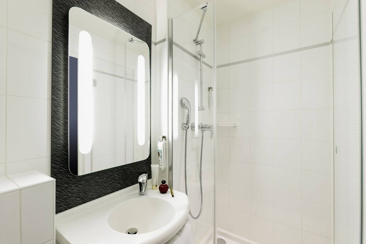 shower, eco-friendly toiletries, hair dryer, towels