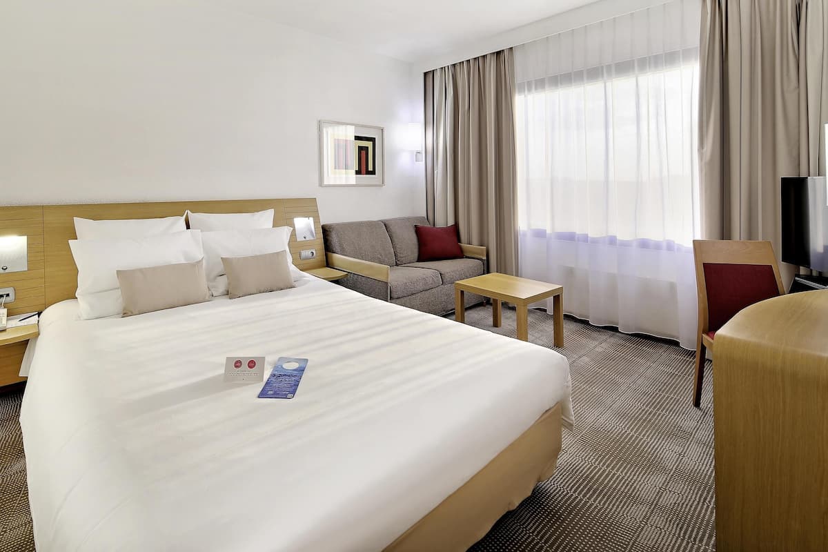 Habitación estándar, 1 cama matrimonial | Ropa de cama de alta calidad y minibar