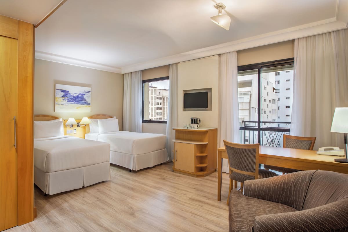 The Innside Room Twin with Balcony | Minibar, in-room safe, desk, blackout curtains