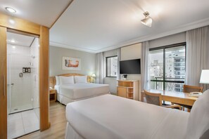 The Innside Triple Queen | Minibar, in-room safe, desk, blackout drapes