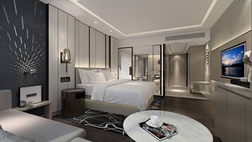 Premium bedding, down comforters, minibar, in-room safe
