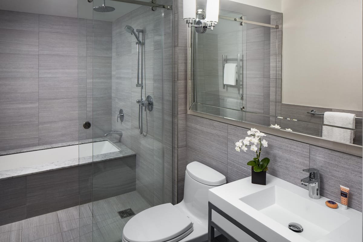 Studio Suite (Brownstone) | Bathroom | Designer toiletries, hair dryer, bathrobes, towels