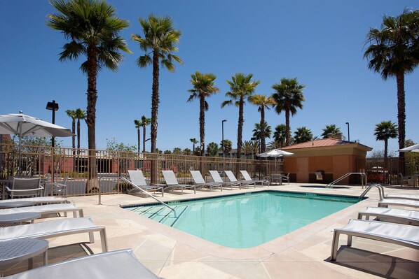 Outdoor pool, open 8:00 AM to 9:00 PM, pool umbrellas, pool loungers