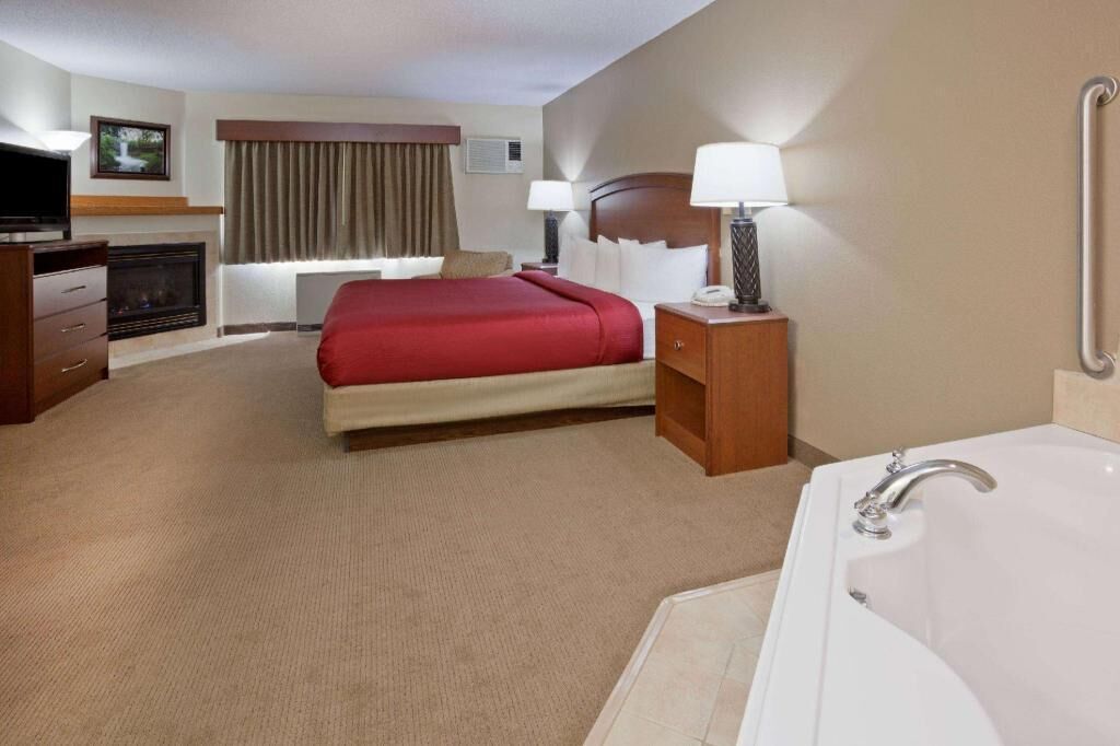 Desk, blackout curtains, iron/ironing board, free cots/infant beds