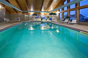 Indoor pool, open 7:00 AM to 11:00 PM, pool loungers