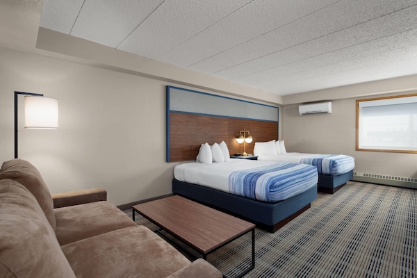 Suite, 2 Queen Beds, Non Smoking | Desk, blackout drapes, iron/ironing board, cribs (free)