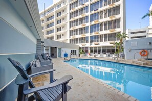 Outdoor pool, open 8:00 AM to 11:00 PM, pool loungers