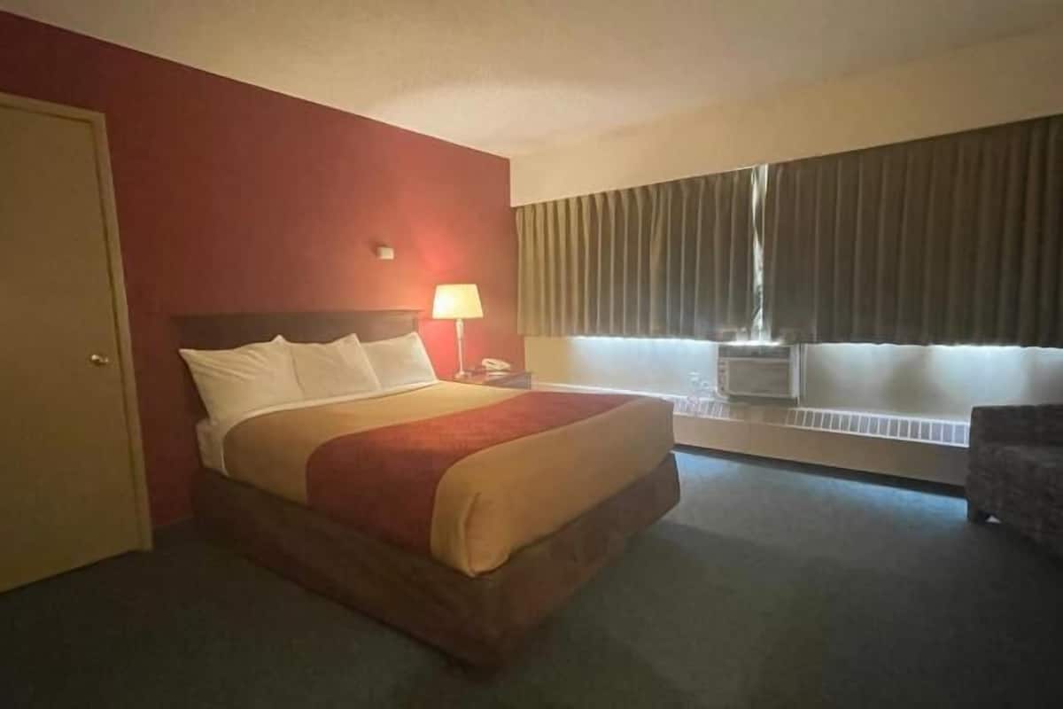 Desk, laptop workspace, blackout curtains, iron/ironing board