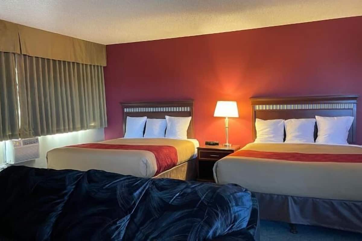 Desk, laptop workspace, blackout curtains, iron/ironing board