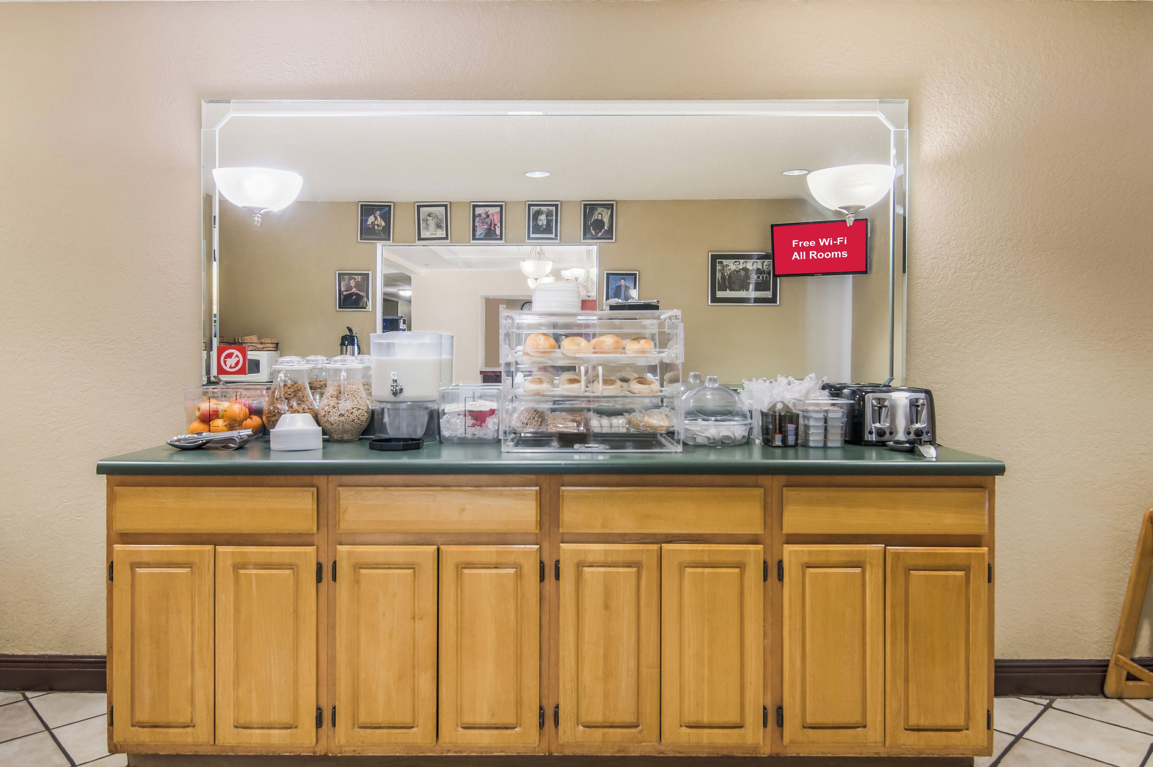 A buffet counter with a sign indicating free Wi-Fi availability.