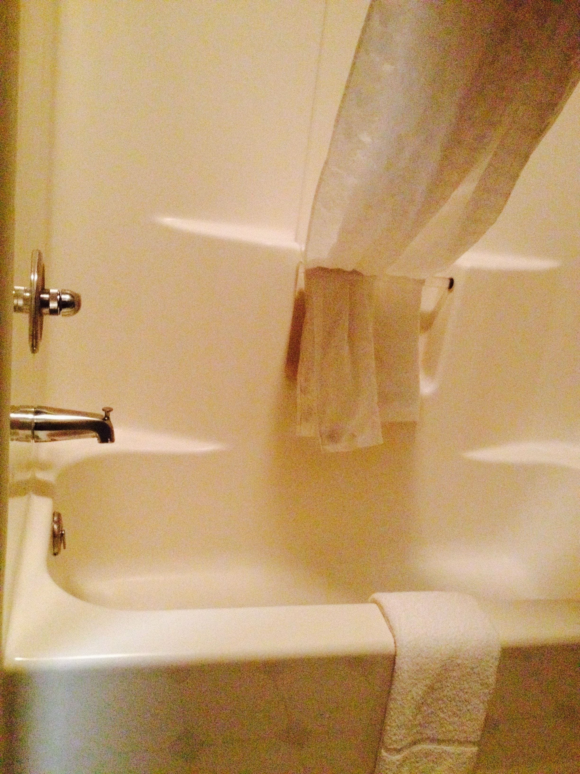 combined shower/bathtub, free toiletries, hair dryer, towels