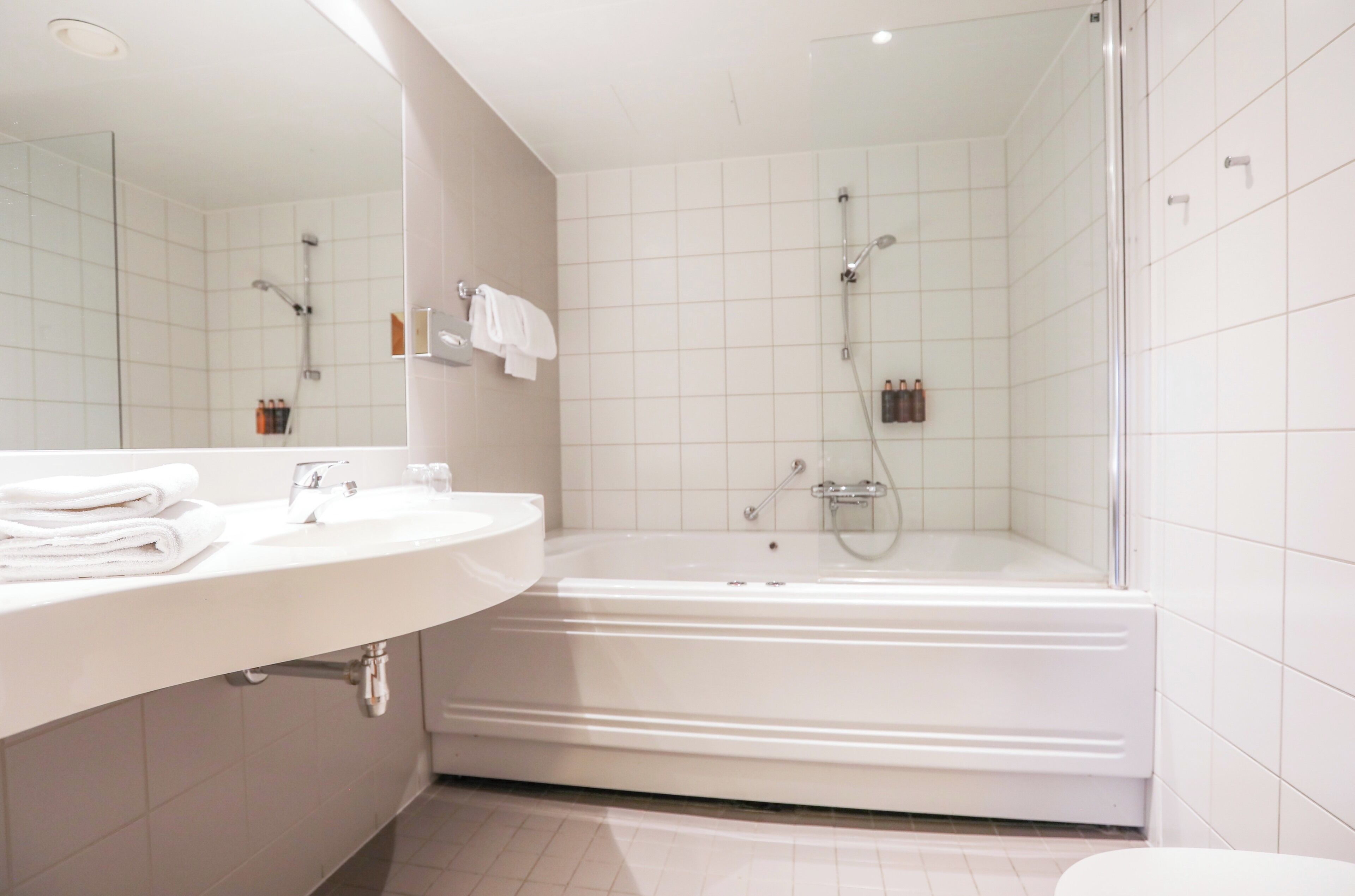 deep-soaking bathtub, hair dryer, heated floors, towels