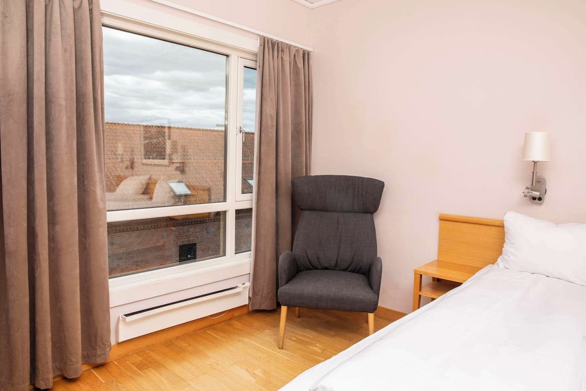 1 bedroom, blackout drapes, iron/ironing board, bed sheets